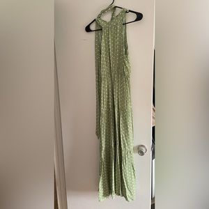 Maxi dress with Pearl button closure.